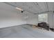 Clean and organized two-car garage with epoxy floor at 195 Cactus Sunrise St, Las Vegas, NV 89138