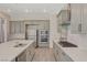 Close-up of kitchen island with stainless steel appliances and gray cabinetry at 195 Cactus Sunrise St, Las Vegas, NV 89138