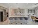 Kitchen featuring a large island, stainless steel appliances, and gray cabinetry at 195 Cactus Sunrise St, Las Vegas, NV 89138