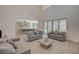 Open-concept living room with tile floors and a seamless transition to the kitchen at 195 Cactus Sunrise St, Las Vegas, NV 89138