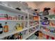 Organized walk-in pantry with lots of shelving and storage space for food and other household items at 195 Cactus Sunrise St, Las Vegas, NV 89138