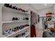 Organized walk-in closet with shelving for shoes and hanging space for clothes at 195 Cactus Sunrise St, Las Vegas, NV 89138