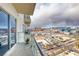 Balcony with expansive city views, offering a seamless indoor-outdoor experience at 200 Hoover Ave # 1210, Las Vegas, NV 89101