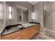 Modern bathroom featuring a square sink, granite countertop, and stylish lighting at 200 Hoover Ave # 1210, Las Vegas, NV 89101