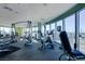Well-equipped gym with modern fitness machines and expansive windows offering panoramic city views at 200 Hoover Ave # 1210, Las Vegas, NV 89101