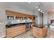 Modern kitchen with stainless steel appliances, granite countertops, and custom cabinetry, blending style with functionality at 200 Hoover Ave # 1210, Las Vegas, NV 89101