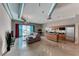 Open-concept living room features modern design elements, city views, and a spacious layout perfect for entertaining at 200 Hoover Ave # 1210, Las Vegas, NV 89101