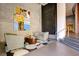 Inviting lobby area with stylish seating, artistic decor, and convenient access to stairs at 200 Hoover Ave # 1210, Las Vegas, NV 89101