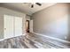 This bedroom has beautiful wood floors and a closet with doors at 2020 Sinfonia Ave, Henderson, NV 89052