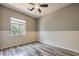 This bedroom has beautiful wood floors and a chair rail at 2020 Sinfonia Ave, Henderson, NV 89052