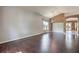 Spacious living room featuring hardwood floors, large windows, and an open layout perfect for entertaining at 2020 Sinfonia Ave, Henderson, NV 89052