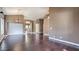 Open-concept living room with hardwood floors, neutral walls, and ample space for furniture arrangement at 2020 Sinfonia Ave, Henderson, NV 89052