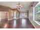 Expansive living area with beautiful hardwood floors, neutral paint, and open access to adjacent rooms at 2020 Sinfonia Ave, Henderson, NV 89052