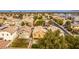 Aerial view of a residential neighborhood with well-maintained homes, trees, and landscaping at 2199 Timescape Ct, Las Vegas, NV 89123