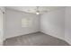Bedroom with carpet flooring, ceiling fan, and a window for natural light at 2199 Timescape Ct, Las Vegas, NV 89123