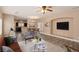 Stylishly decorated living room open to dining area and kitchen at 2199 Timescape Ct, Las Vegas, NV 89123