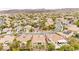 An aerial view showcasing a well-maintained home with a decorative hardscape design and mature landscaping at 2295 Aria Dr, Henderson, NV 89052