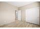 Bedroom featuring light wood tile flooring and a closet at 2295 Aria Dr, Henderson, NV 89052