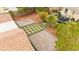 This beautiful backyard boasts a decorative hardscape design and mature landscaping at 2295 Aria Dr, Henderson, NV 89052