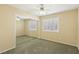 Neutral bedroom with mirrored closet doors and bright, shuttered windows at 2323 Carinth Way, Henderson, NV 89074