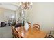 Elegant dining room featuring a chandelier and large windows at 2323 Carinth Way, Henderson, NV 89074
