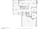 Detailed floor plan showcasing layout of the home's first floor, including kitchen, living, and garage at 2323 Carinth Way, Henderson, NV 89074