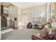 Spacious living room with high ceilings, natural light, and comfortable seating at 2323 Carinth Way, Henderson, NV 89074