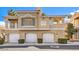 Multi-level townhome complex showcasing well-maintained facades, garages, and common areas at 251 S Green Valley Pkwy # 3412, Henderson, NV 89012