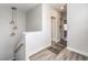 Upstairs hallway with modern lighting fixtures and vinyl floors throughout at 251 S Green Valley Pkwy # 3412, Henderson, NV 89012