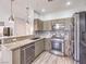 Modern kitchen with stainless steel appliances and granite countertops offers style and functionality at 251 S Green Valley Pkwy # 3412, Henderson, NV 89012