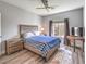 Comfortable main bedroom with hardwood floors and a large window overlooking the scenery at 251 S Green Valley Pkwy # 3412, Henderson, NV 89012