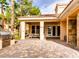 Outdoor patio featuring a built-in grill, seating, and serene community surroundings at 251 S Green Valley Pkwy # 3412, Henderson, NV 89012