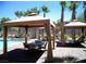 Inviting poolside cabana with seating area, perfect for outdoor gatherings and relaxation at 251 S Green Valley Pkwy # 3412, Henderson, NV 89012