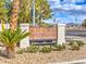 Elegant Bella Vista Condominiums sign nestled among desert landscaping at the community entrance at 251 S Green Valley Pkwy # 3412, Henderson, NV 89012
