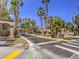 Picturesque street view showcasing Bella Vista's gated entrance and beautifully landscaped community at 251 S Green Valley Pkwy # 3412, Henderson, NV 89012