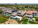 Gorgeous aerial view of luxury homes featuring private pools, spas and tile roofs at 2623 Turtle Head Peak Dr, Las Vegas, NV 89135
