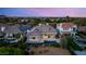 Sprawling estate with a resort-style backyard, featuring a pool, spa, and lush greenery from an aerial perspective at 2623 Turtle Head Peak Dr, Las Vegas, NV 89135