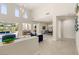 Spacious living room with high ceilings, stylish furnishings, and seamless indoor-outdoor living at 2623 Turtle Head Peak Dr, Las Vegas, NV 89135