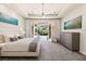 Spacious main bedroom with a view of the pool, featuring a ceiling fan and neutral decor at 2623 Turtle Head Peak Dr, Las Vegas, NV 89135
