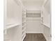 Spacious walk-in closet featuring custom shelving and ample storage space for an organized wardrobe at 2623 Turtle Head Peak Dr, Las Vegas, NV 89135