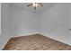 Well-lit bedroom with hardwood floors and neutral wall paint at 2813 Vista Butte Dr, Las Vegas, NV 89134