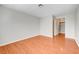 A bright bedroom with hardwood floors and a closet at 3151 Soaring Gulls Dr # 1010, Las Vegas, NV 89128