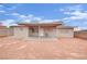 Backyard with covered patio area, featuring a detached structure at 3305 Palomar St, North Las Vegas, NV 89030