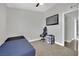 Clean bedroom with carpet, window, and door providing a comfortable and private space at 3305 Palomar St, North Las Vegas, NV 89030