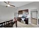 Modern kitchen featuring stainless steel appliances and a dining area, creating a functional and stylish space at 3305 Palomar St, North Las Vegas, NV 89030