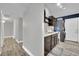 Functional laundry room featuring a sink, cabinets, and modern washer and dryer for added convenience at 3305 Palomar St, North Las Vegas, NV 89030