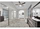 Bright main bedroom with open arch to the bathroom offering style and convenience at 3305 Palomar St, North Las Vegas, NV 89030