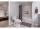 Cozy bathroom with a shower-tub combination and direct access to the adjacent bedroom at 3440 Pino Cir, Las Vegas, NV 89121