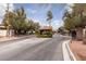 Welcome to this community featuring a charming entrance with lush landscaping and a secure gate at 3440 Pino Cir, Las Vegas, NV 89121