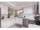 Updated kitchen featuring stainless steel appliances, recessed lighting, and tiled floor at 3440 Pino Cir, Las Vegas, NV 89121